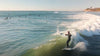 Man Surfing On The Classic Surf