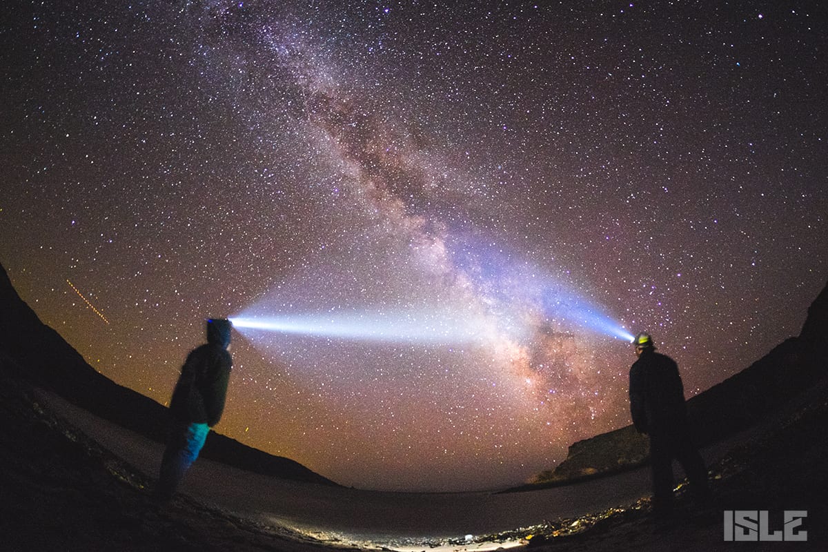Standup Paddle Boarding On Big Sur Coast While Star Gazing On The Beach