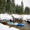 Man Paddling The Explorer Paddle Board In Winter
