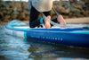 Person Kneeling On The Explorer Paddle Board