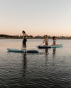 Two Megalodon Paddle Boards Being Paddled