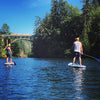 Man On The River On The Pioneer Paddle Board