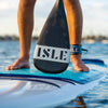 Person Paddling The Versa Paddle Board In The Water